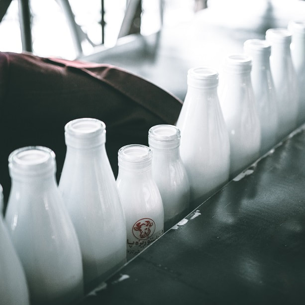 Milk in glass bottle. We take a look at milk prices in South Africa